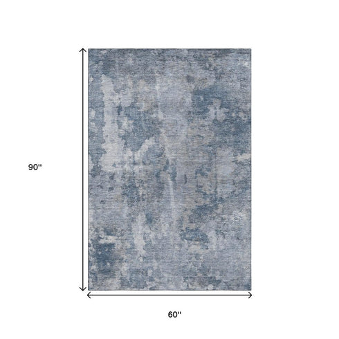 5' X 8' Blue And Ivory Abstract Washable Area Rug With UV Protection