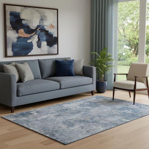 5' X 8' Blue And Ivory Abstract Washable Area Rug With UV Protection