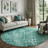 5' X 8' Teal And Ivory Ikat Washable Area Rug With UV Protection