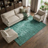 5' X 8' Teal And Ivory Ikat Washable Area Rug With UV Protection