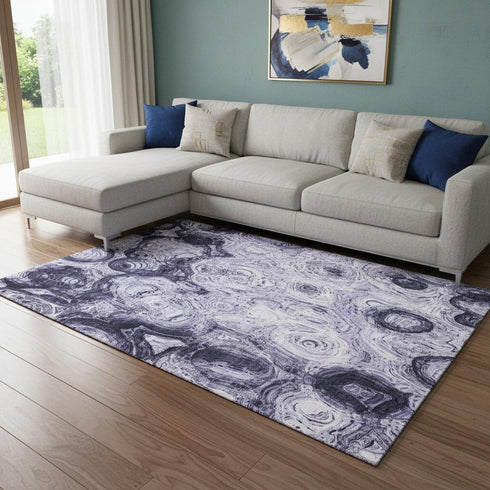 9' X 12' Purple And Ivory Abstract Washable Area Rug With UV Protection