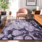 9' X 12' Purple And Ivory Abstract Washable Area Rug With UV Protection