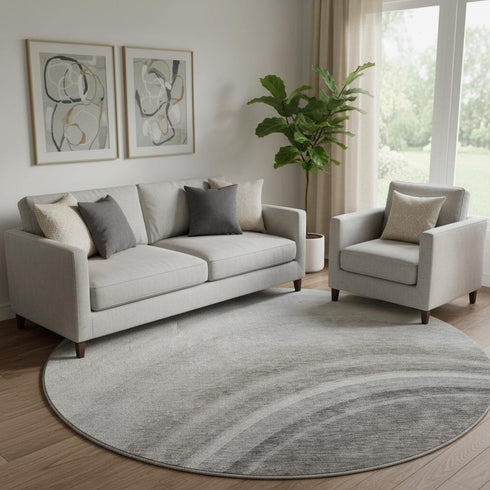 8' Gray Ivory And Beige Ombre Washable Round Rug With UV Protection
