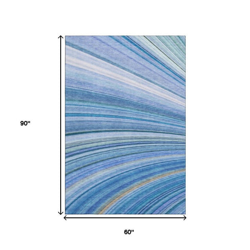 5' X 8' Blue Ivory And Gold Abstract Washable Area Rug With UV Protection