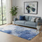 5' X 8' Blue And Ivory Abstract Washable Area Rug With UV Protection
