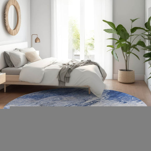 8' Blue And Ivory Abstract Washable Round Rug With UV Protection