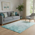5' X 8' Teal And Ivory Abstract Washable Area Rug With UV Protection