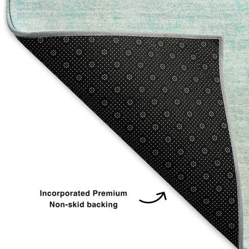 5' X 8' Teal And Ivory Abstract Washable Area Rug With UV Protection