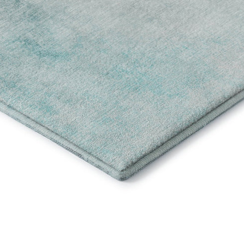 5' X 8' Teal And Ivory Abstract Washable Area Rug With UV Protection