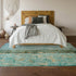 9' X 12' Blue Gold And Green Abstract Washable Area Rug With UV Protection
