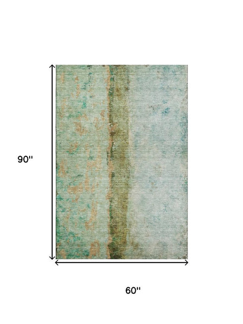 5' X 8' Green Blue And Gold Abstract Washable Area Rug With UV Protection