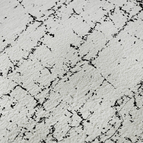 8' X 10' Black And Ivory Abstract Washable Area Rug With UV Protection