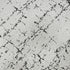 8' X 10' Black And Ivory Abstract Washable Area Rug With UV Protection