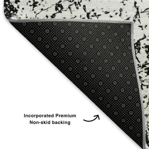 8' X 10' Black And Ivory Abstract Washable Area Rug With UV Protection