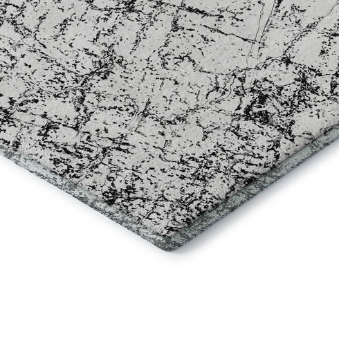 8' X 10' Black And Ivory Abstract Washable Area Rug With UV Protection