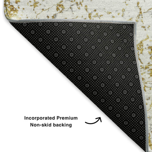 5' X 8' Gold And Ivory Abstract Washable Area Rug With UV Protection