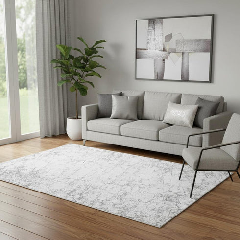 5' X 8' Gray And Ivory Abstract Washable Area Rug With UV Protection