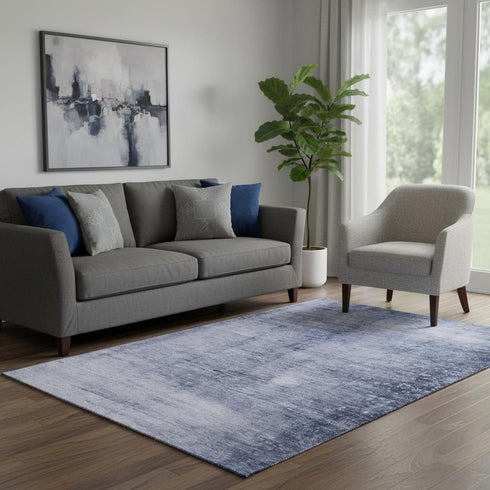 5' X 8' Navy Blue And Ivory Abstract Washable Area Rug With UV Protection