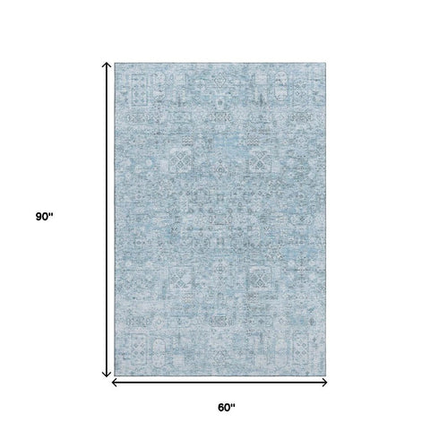 9' X 12' Sky Blue And Ivory Floral Washable Area Rug With UV Protection