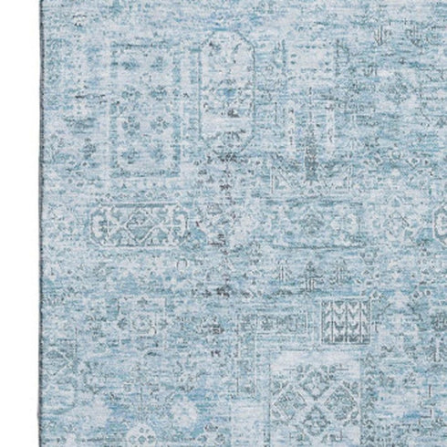 9' X 12' Sky Blue And Ivory Floral Washable Area Rug With UV Protection