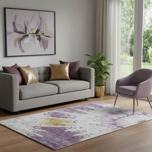 5' X 8' Purple Gold And Ivory Abstract Washable Area Rug With UV Protection