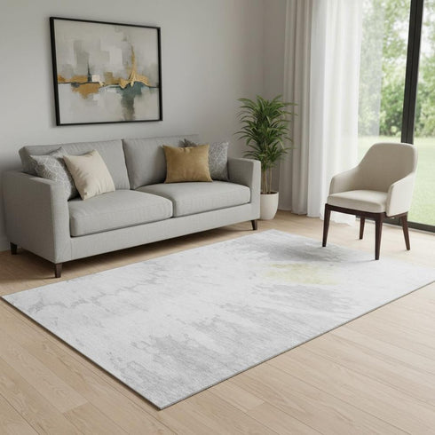 5' X 8' Silver Gold And Ivory Abstract Washable Area Rug With UV Protection