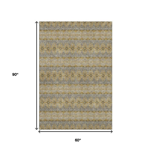 5' X 8' Gold Blue And Ivory Floral Medallion Washable Area Rug With UV Protection