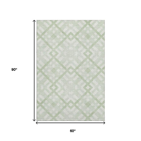 5' X 8' Mint Green And Ivory Geometric Washable Area Rug With UV Protection
