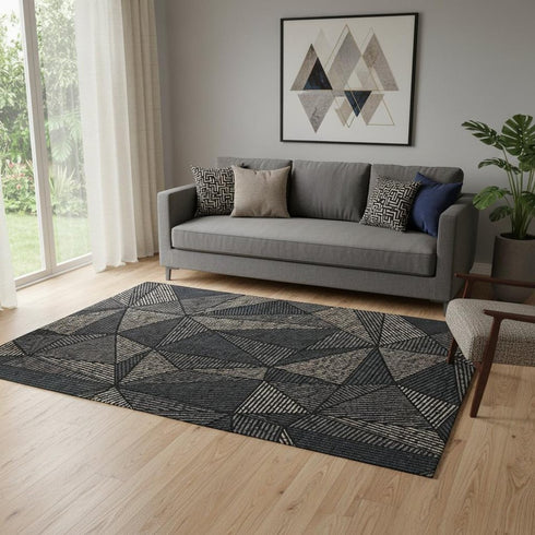 5' X 8' Black And Ivory Geometric Washable Area Rug With UV Protection
