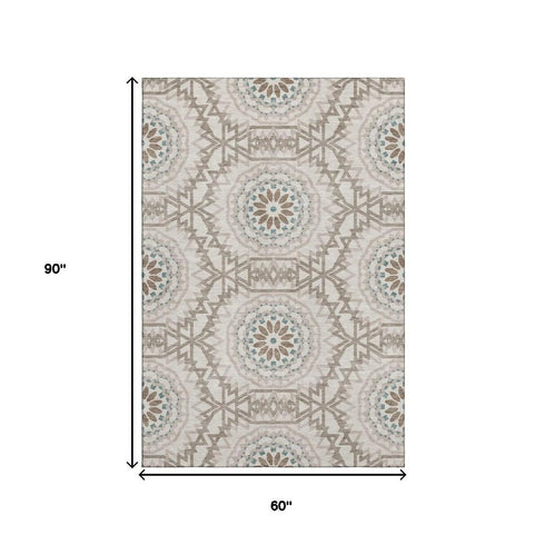 5' X 8' Beige Teal And Brown Geometric Washable Area Rug With UV Protection