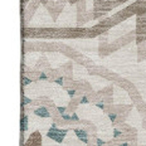 5' X 8' Beige Teal And Brown Geometric Washable Area Rug With UV Protection