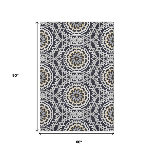 5' X 8' Black Ivory And Gold Geometric Washable Area Rug With UV Protection