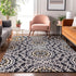 9' X 12' Black Ivory And Gold Geometric Washable Area Rug With UV Protection