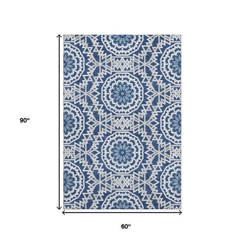 5' X 8' Navy Blue And Ivory Geometric Washable Area Rug With UV Protection