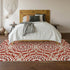 8' X 10' Red And Ivory Geometric Washable Area Rug With UV Protection