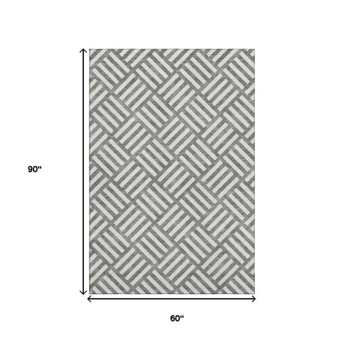 5' X 8' Charcoal And Ivory Geometric Washable Area Rug With UV Protection