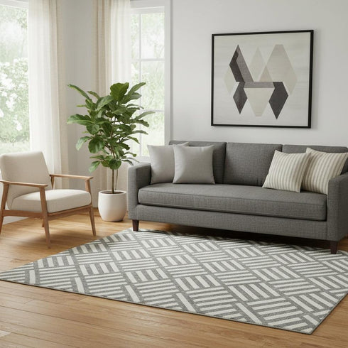 5' X 8' Charcoal And Ivory Geometric Washable Area Rug With UV Protection