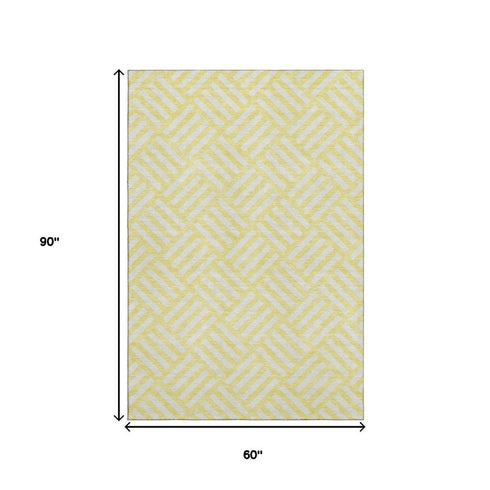 5' X 8' Yellow And Ivory Geometric Washable Area Rug With UV Protection