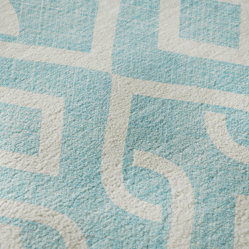 8' X 10' Aqua And Ivory Geometric Washable Area Rug With UV Protection