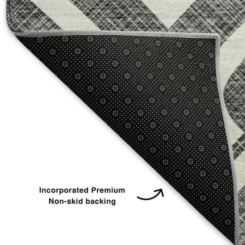 5' X 8' Black And Ivory Geometric Washable Area Rug With UV Protection
