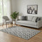 5' X 8' Black And Ivory Geometric Washable Area Rug With UV Protection