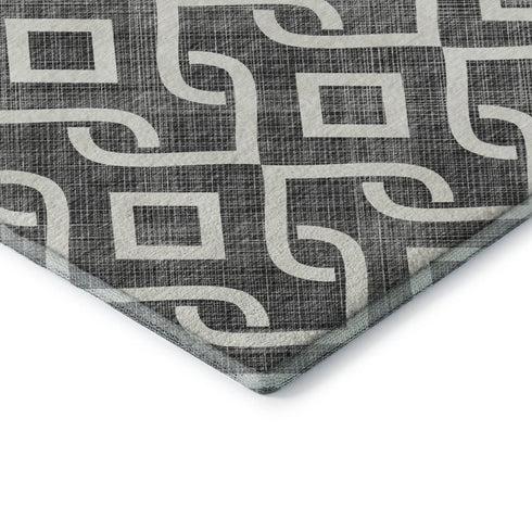 8' X 10' Black And Ivory Geometric Washable Area Rug With UV Protection