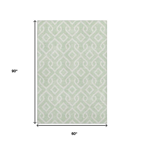 5' X 8' Mint Green And Ivory Geometric Washable Area Rug With UV Protection