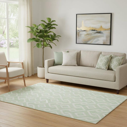 5' X 8' Mint Green And Ivory Geometric Washable Area Rug With UV Protection