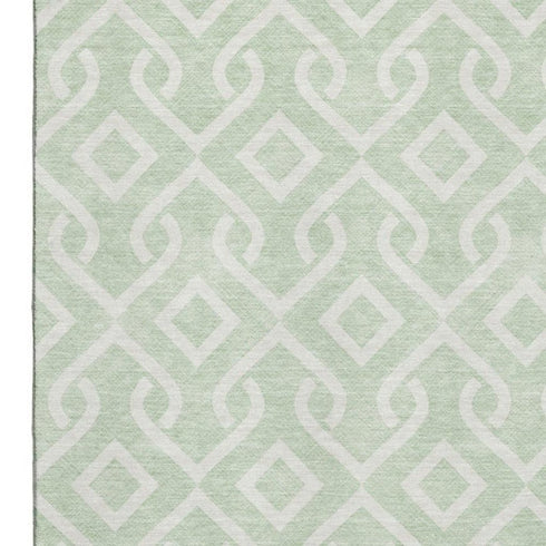 5' X 8' Mint Green And Ivory Geometric Washable Area Rug With UV Protection
