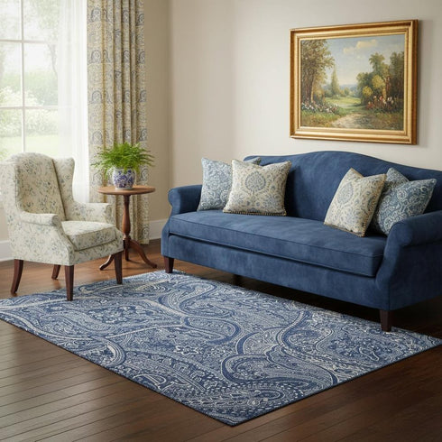 5' X 8' Navy Blue And Ivory Paisley Washable Area Rug With UV Protection
