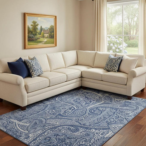 9' X 12' Navy Blue And Ivory Paisley Washable Area Rug With UV Protection