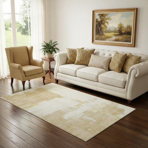 5' X 8' Beige Ivory And Gold Abstract Washable Area Rug With UV Protection