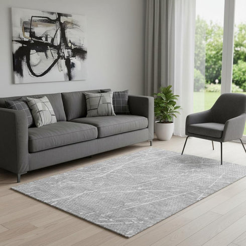 5' X 8' Gray And Ivory Abstract Washable Area Rug With UV Protection