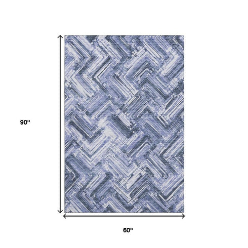 5' X 8' Blue And Ivory Chevron Washable Area Rug With UV Protection